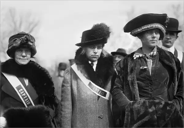 SUFFRAGETTES, 1913. Three suffragettes identified as Mary Bair, Mrs. Albert Wood and Mrs