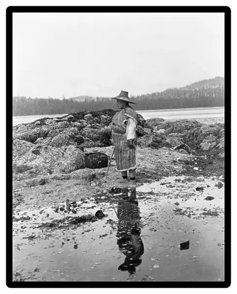 NAK WAXDA XW WOMAN, c1910. A Nak waxda xw woman standing on the beach in British Columbia