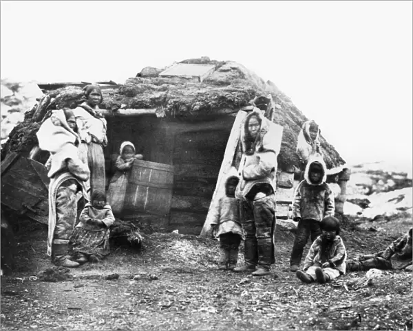 CANADA: ESKIMO FAMILY, 1860. An Eskimo family group of the Eastern Canadian Arctic