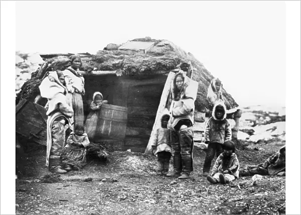 CANADA: ESKIMO FAMILY, 1860. An Eskimo family group of the Eastern Canadian Arctic