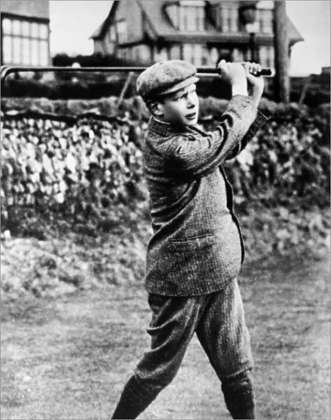 GEORGE VI (1895-1952). King of Great Britain, 1936-1952. Playing golf as a child, c1910