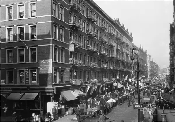 LOWER EAST SIDE, c1909. An outdoor market on Orchard Street and Rivington Street