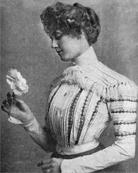 FASHION: SHIRTWAIST, 1900. A ladies shirt waist of pink silk with lace-edged tucks