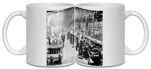 ENGLAND: ARMS FACTORY. Assembly line at the Vickers, Sons & Maxin guns and ammunition