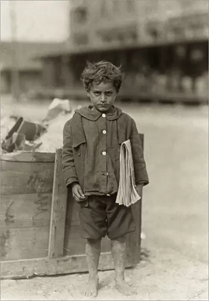 HINE: NEWSBOY, 1913. Four-year-old newsboy selling newspapers barefoot in Tampa, Florida