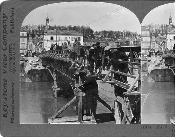WORLD WAR I: MARNE BRIDGE. Wooden bridge over the Marne River at Chateau-Theirry