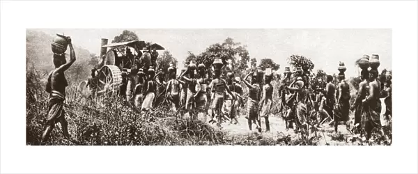 WORLD WAR I: CAMEROON. Women in Cameroon carrying water to a British traction engine
