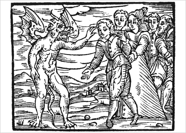 SATAN & SORCERER, 1626. Satan applying his claw mark to an apprentice sorcerer