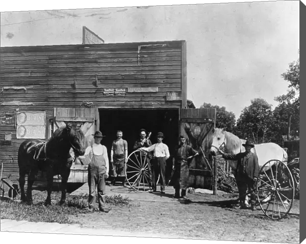 BLACKSMITH SHOP, c1900. The blacksmith shop at White Bear Lake, Minnesota. Photograph