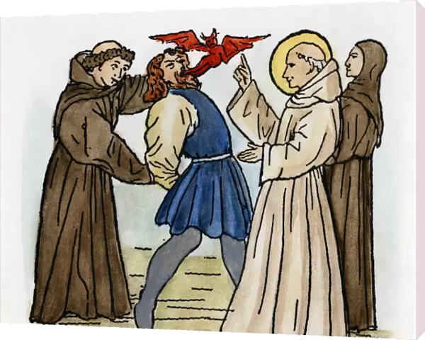 EXORCISING A DEMON. A medieval saint exorcising a demon. Woodcut