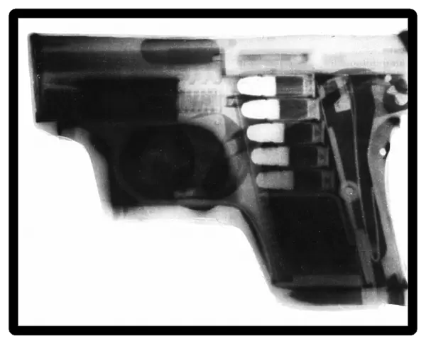 X-RAY OF AUTOMATIC PISTOL. American, 1928