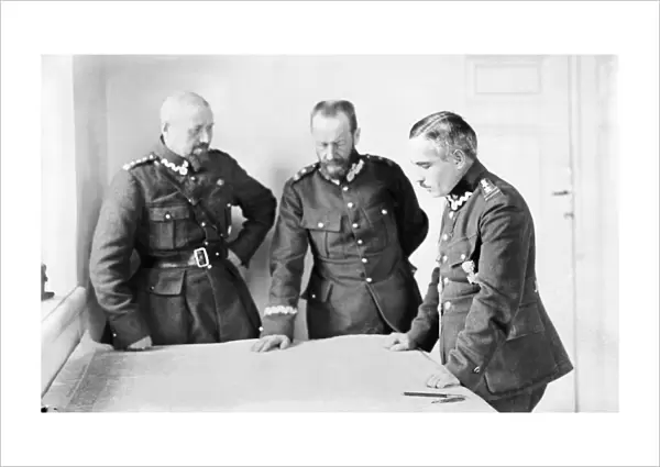 LUCJAN ZELIGOWSKI (1865-1947). Polish general Lucjan Zeligowski, center, meeting