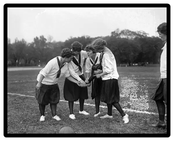 SOCCER, c1920. Young women on a soccer field. Photograph, c1920