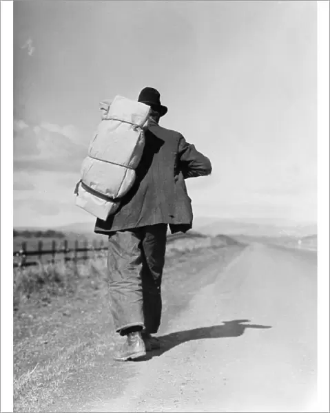 MIGRANT WORKER, 1935. Migrant worker on a California highway