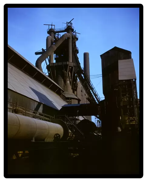 STEEL MILL, 1941. Blast furnace at the Carnegie-Illinois Steel Corporation mill in Etna