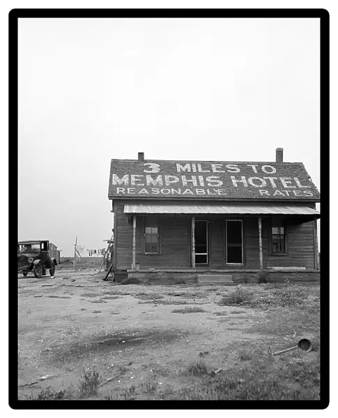TEXAS: HOTEL, 1937. Sign for a hotel in Memphis, Texas. Photograph by Dorothea Lange