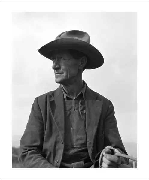 IDAHO: FARMER, 1939. Ex-Nebraska farmer developing a farm out of the stumps in Bonner County