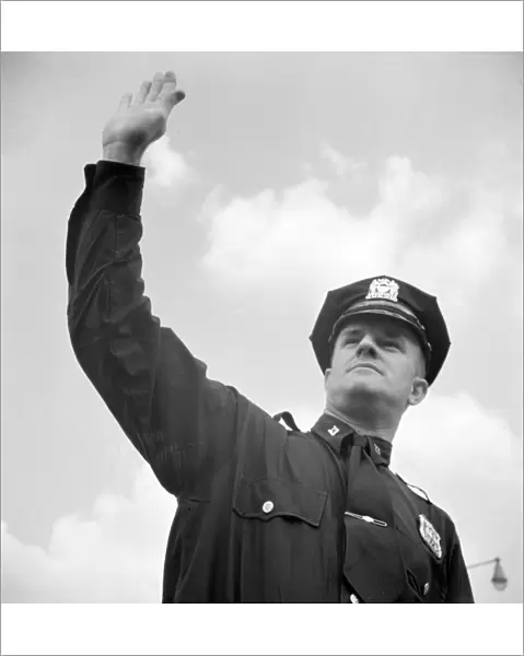 NEW YORK: POLICE OFFICER. Portrait of an Irish-American policeman in Central Park, New York City