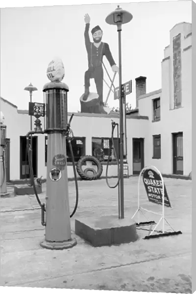 MINNESOTA, 1939. Paul Bunyan atop a gas station in Bemidji, Minnesota. Photograph by John Vachon