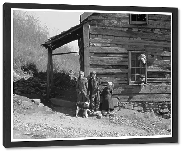 VIRGINIA: FAMILY, 1935. Fennel Corbin and two of his grandchildren outside a home