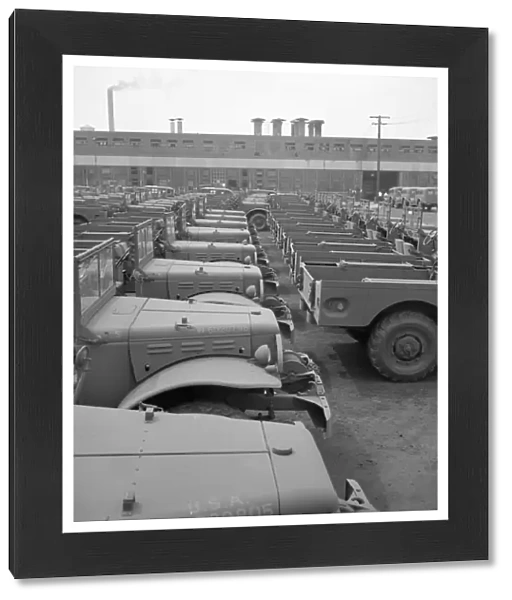 DETROIT: FACTORY, 1942. Newly assembled Army trucks at the Chrysler Corporation plant in Detroit