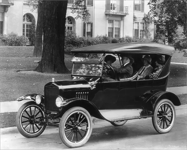 FORD AUTOMOBILE, c1923. Ford touring car with convertible top, with two men