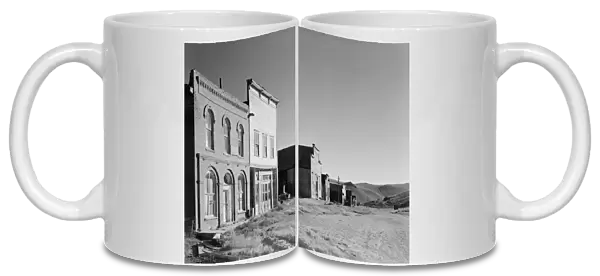 CALIFORNIA: BODIE, 1962. Abandoned buildings along Main Street in the ghost town of Bodie
