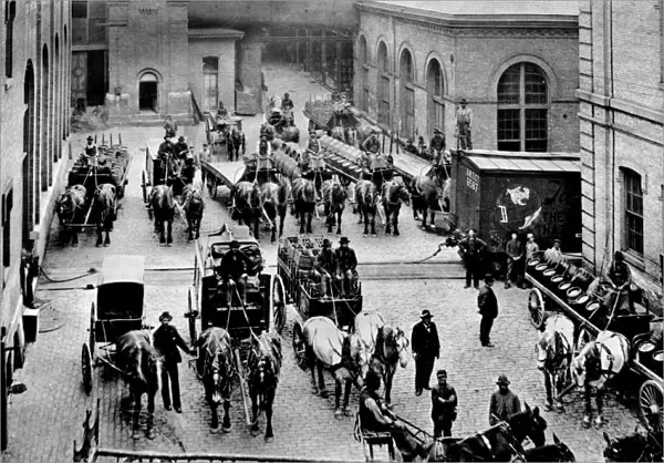 MILWAUKEE: SHIPPING YARD. Horse-drawn wagons filled with kegs of beer at a Schlitz