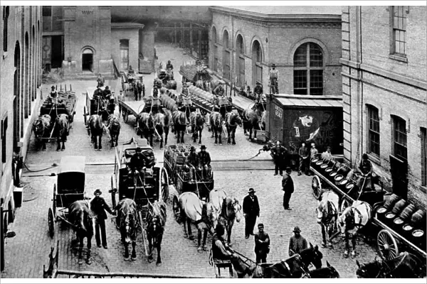 MILWAUKEE: SHIPPING YARD. Horse-drawn wagons filled with kegs of beer at a Schlitz