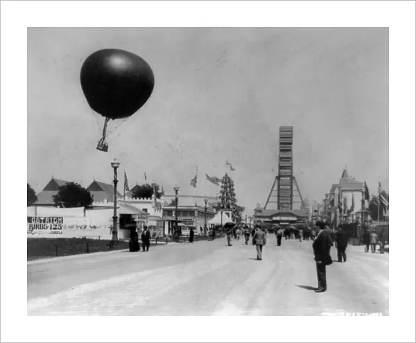 COLUMBIAN EXPOSITION, 1893. A captive balloon and ferris wheel, at the World s