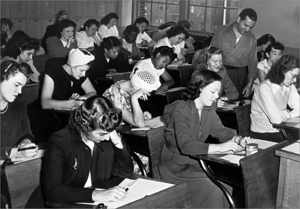 NEW YORK: POLICE EXAM, 1947. Women taking the qualifying exam for the New York