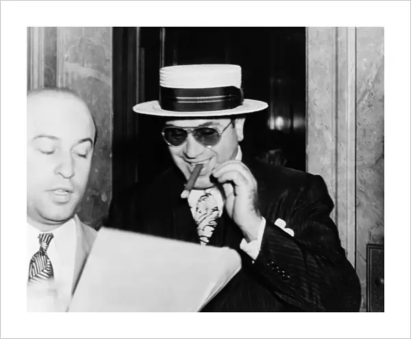 AL CAPONE (1899-1947). American gangster. Photographed leaving the federal building in Miami