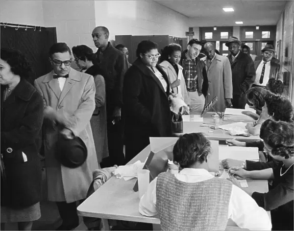 MARYLAND: VOTING, 1962. Voters on Election Day in Maryland. Photograph by Warren K