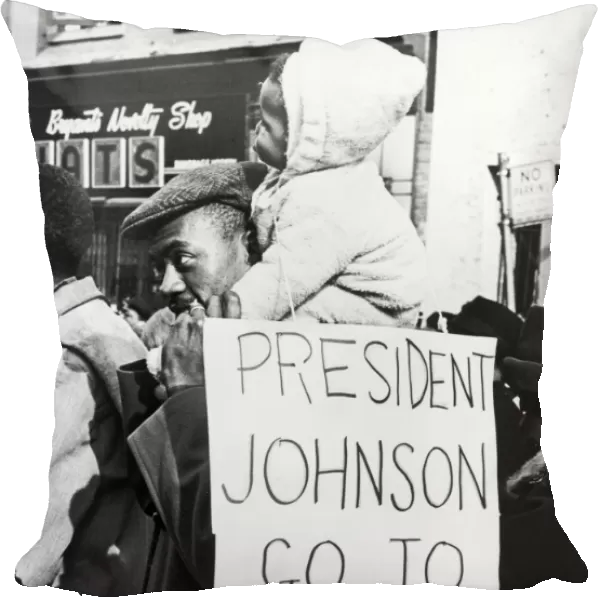 NEW YORK: CIVIL RIGHTS PROTEST, 1965. An African American man with a child on his