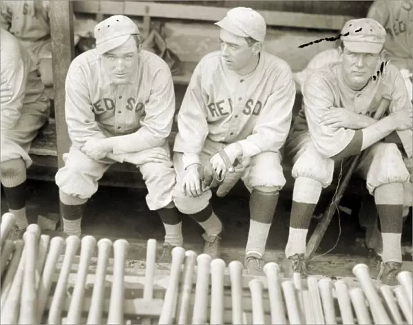 BOSTON RED SOX, 1916. Baseball players for the Boston Red Sox seated on a bench, 1916. Left to right: Babe Ruth, Bill Carrigan, Jack Barry and Vean Gregg