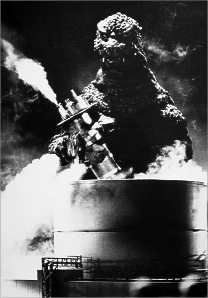 GODZILLA. Godzilla destroying an oil refinery in one of the Japanese Godzilla movies