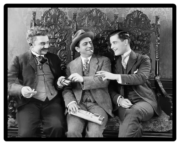 SILENT FILM STILL: SMOKING. Ernest Lubitsch, Ramon Novarro and Jean Hersholt in Old Heidelberg, 1927