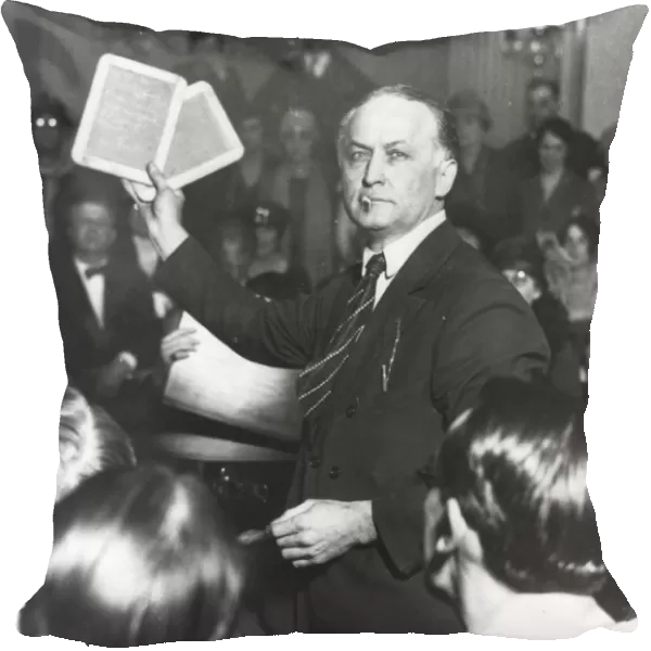 HARRY HOUDINI (1874-1926). American magician. Houdini appearing before a Senate committee to expose fake spiritualists, 1926