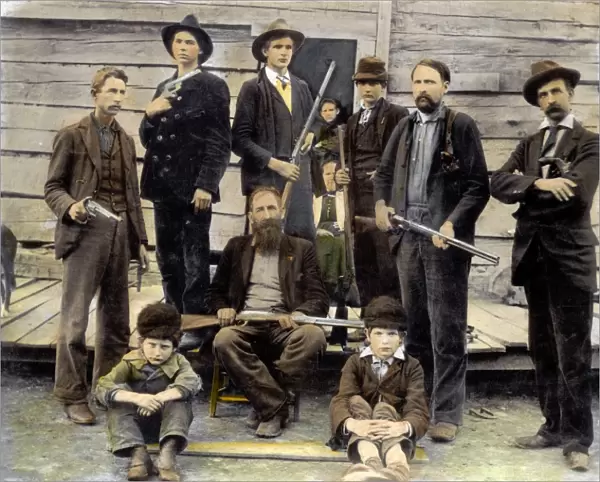 THE HATFIELDS, 1899. Some members of the Hatfield clan: oil over a photograph, 1899