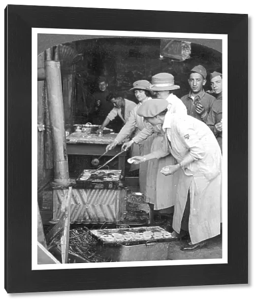 YMCA WOMEN WORKERS YMCA women making doughnuts for American doughboys at Montabaur on the Rhine: stereograph, 1918