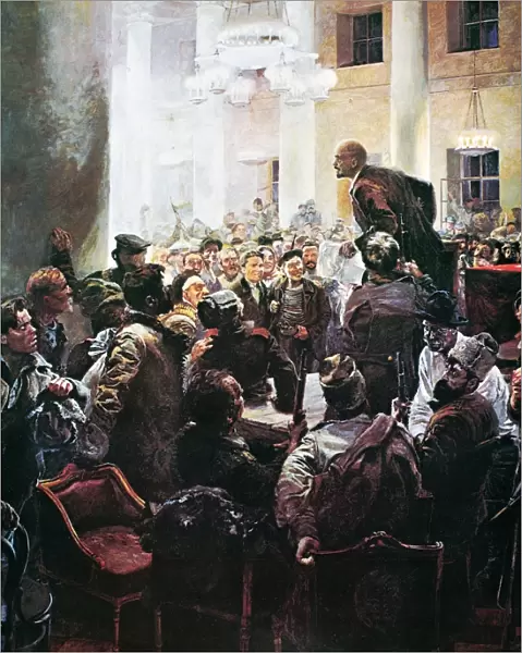 RUSSIAN REVOLUTION, 1917. Vladimir Ilyich Lenin addressing a meeting of the Second All-Russian Congress of Soviets at the Smolny Institute in Petrograd shortly after the start of the Bolshevik Revolution, November 1917