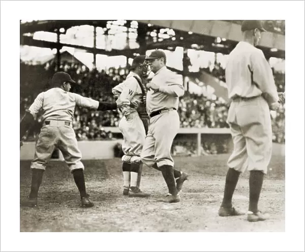 BABE RUTH (1895-1948). American professional baseball player. Ruth arriving at home plate after hitting a home run in Washington, D. C. on April 21, 1924