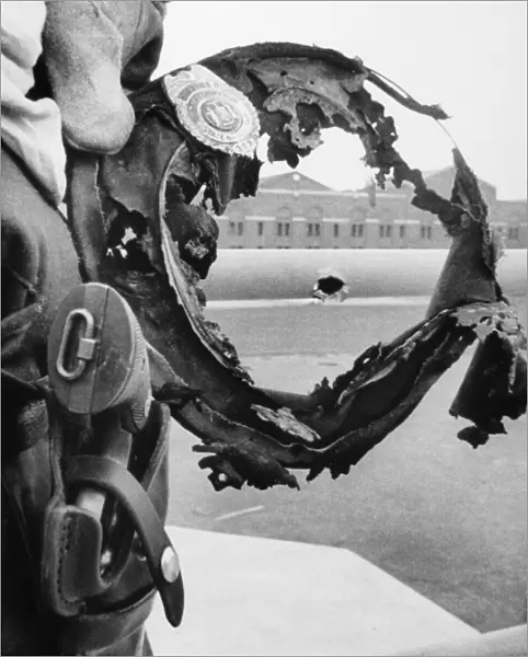 ATTICA PRISON RIOT, 1971. The burned hat of a prison guard frames a bullet hole in the railing surrounding cell block D of Attica Correctional Facility in Attica, New York, following the inmate riot on 13 September 1971