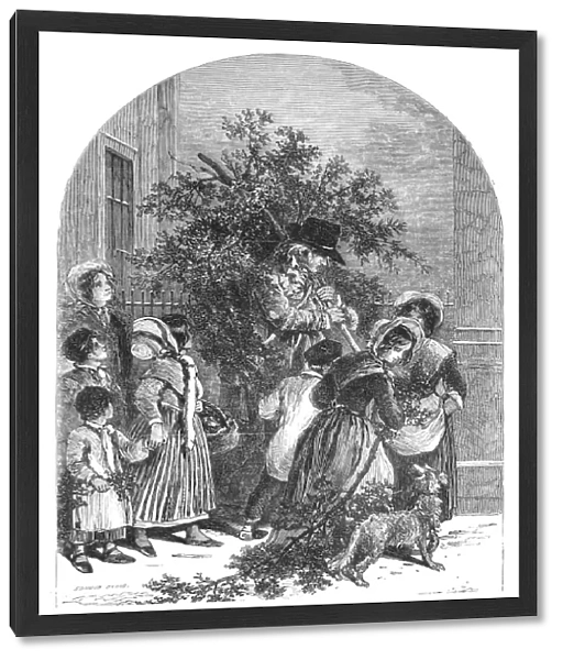CHRISTMAS MISTLETOE, 1854. The mistletoe seller. Wood engraving, English, 1854, after a drawing by Myles Birket Foster