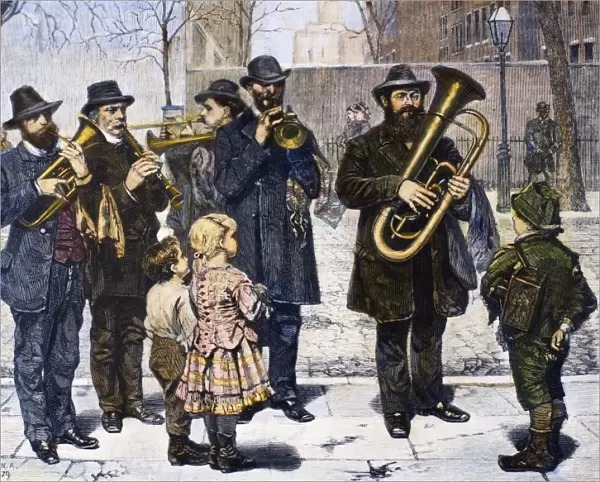GERMAN STREET BAND, 1879. A German street band performing in New York City. Wood engraving, American, 1879, after a painting by John George Brown