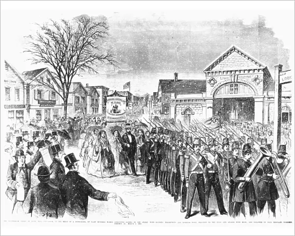 STRIKING WOMEN, 1860. Eight hundred striking women shoemakers of Lynn, Massachusetts, parading in a snowstorm behind the Lynn City Guards, 7 March 1860. Contemporary American wood engraving