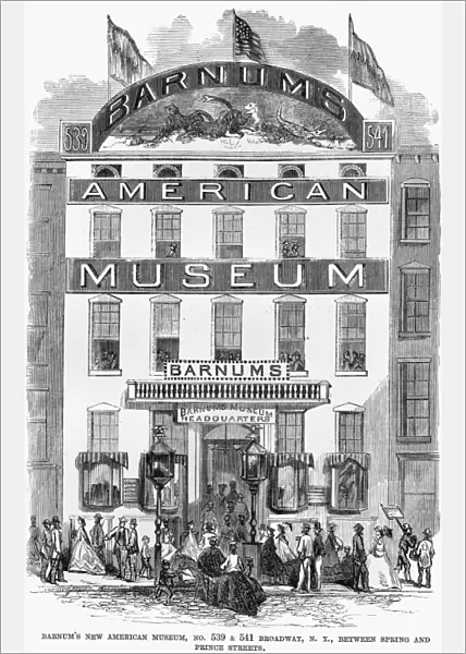 BARNUMs MUSEUM, 1865. View of P. T. Barnums American Museum, on Broadway between Spring and Prince Streets, New York City. Wood engraving, 1865