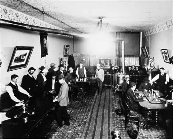 Men in a saloon in Leadville, Colorado. Photographed by Virgil G. Jackson, c1900