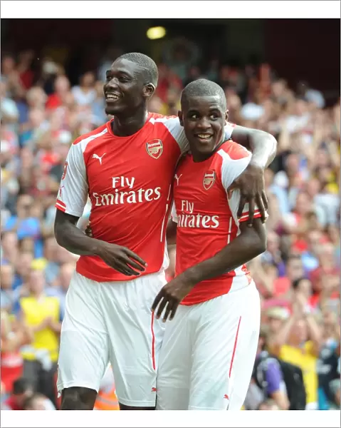 Arsenal's Sanogo and Campbell Celebrating Goals Against Benfica in 2014-15 Emirates Cup
