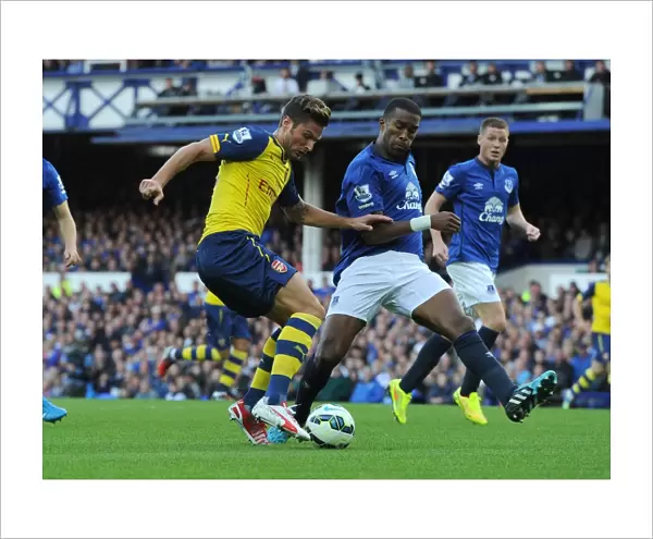 Olivier Giroud (Arsenal) Sylvain Distin (Everton). Everton 2: 2 Arsenal. Barclays Premier League